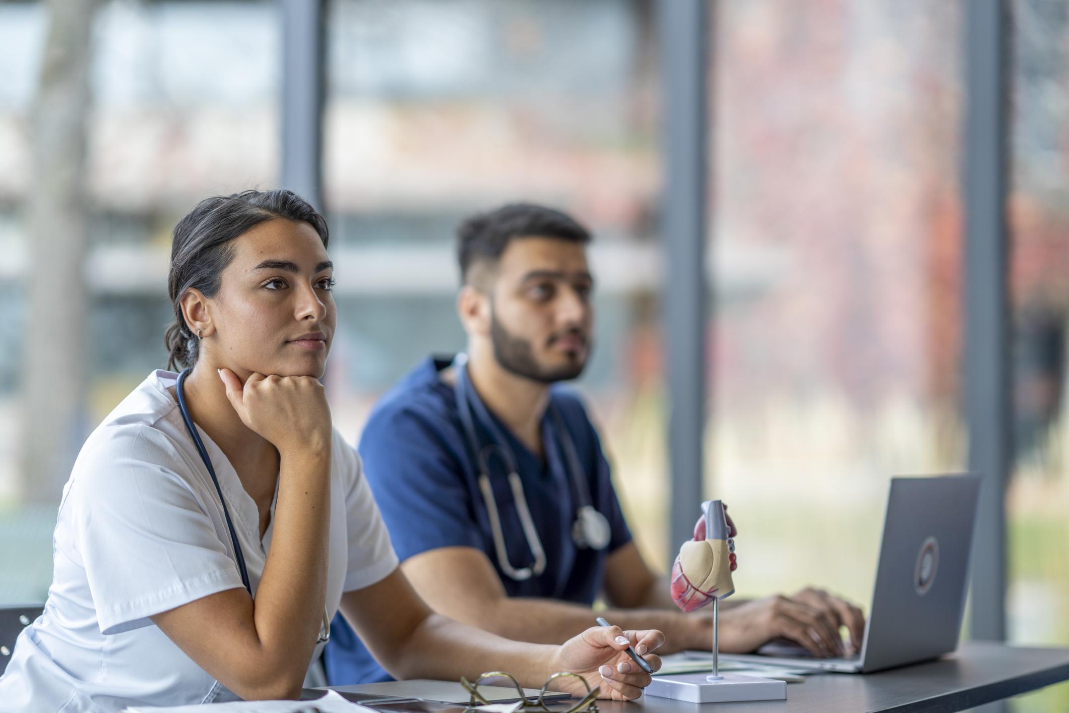 Nurses listening in class